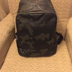 MCM Stencil lion duke backpack  goat leather